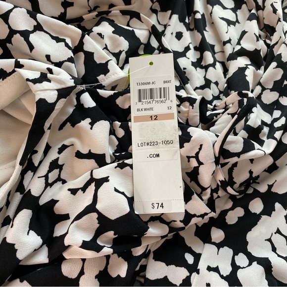 London Style Collection Dotted Halter Neck Jumpsuit - Picture 10 of 14